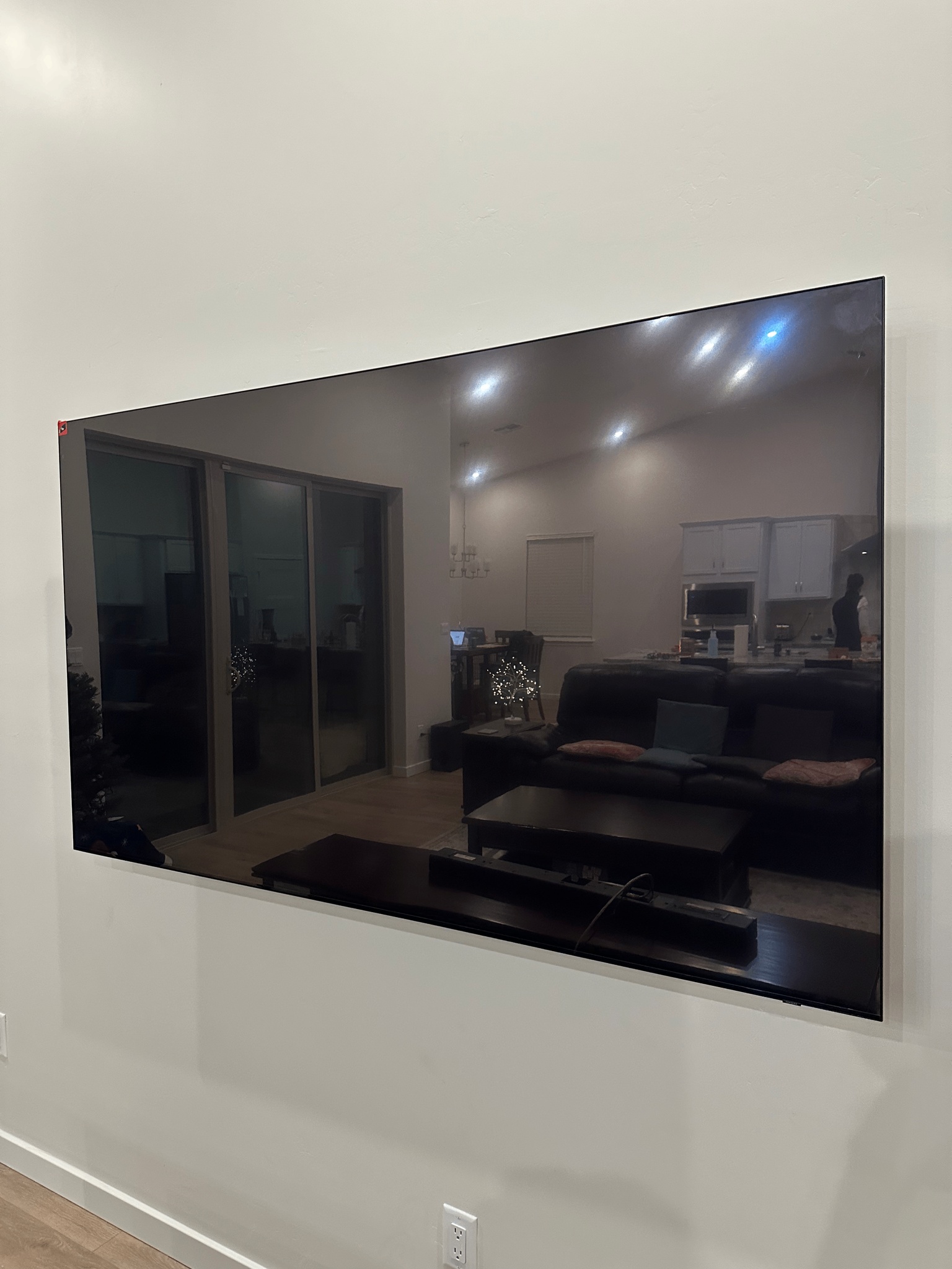 Large TV professionally wall mounted