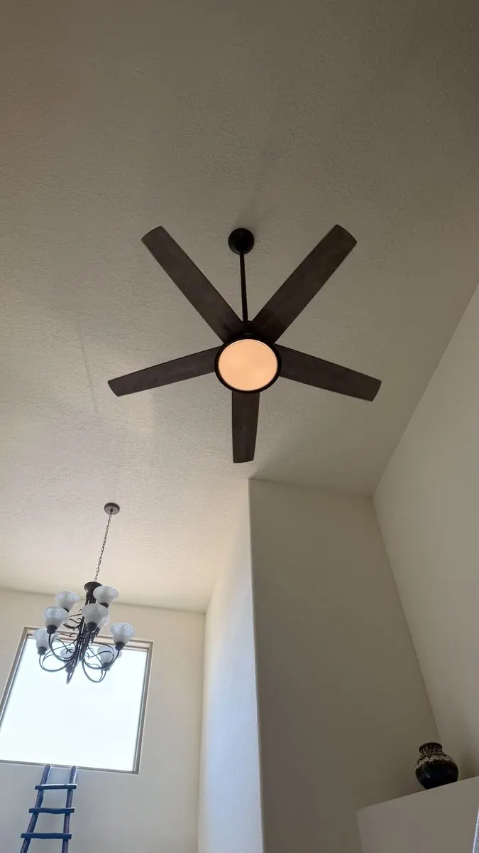 New ceiling fan with light installed on a vaulted ceiling, Albuquerque