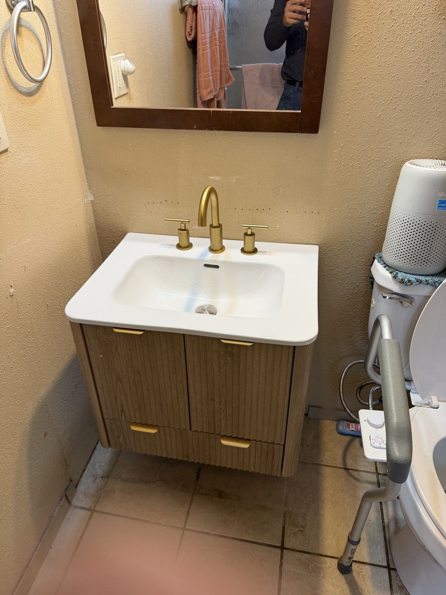 Floating vanity and faucet installed