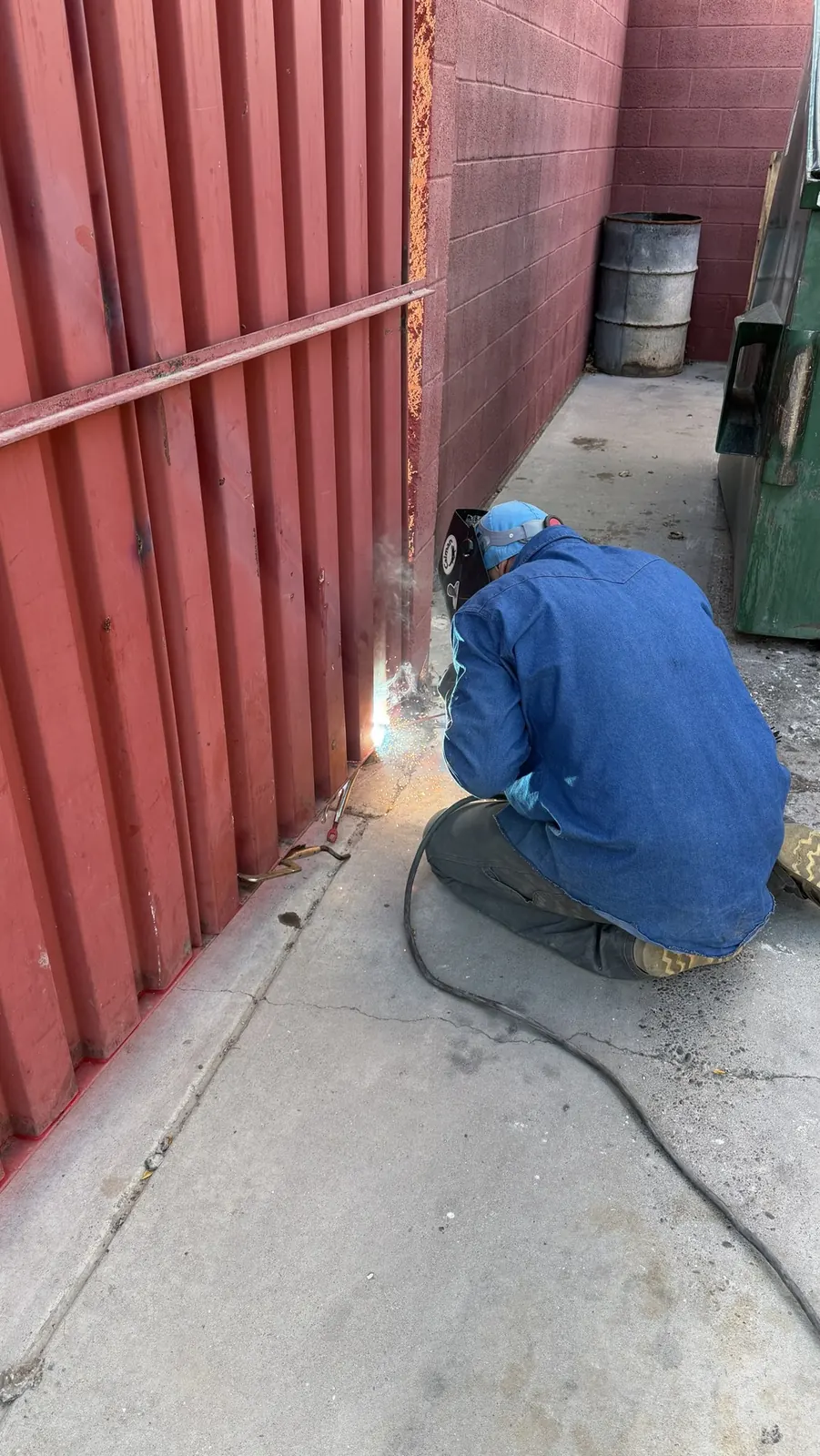 Welding repair on a steel enclosure gate