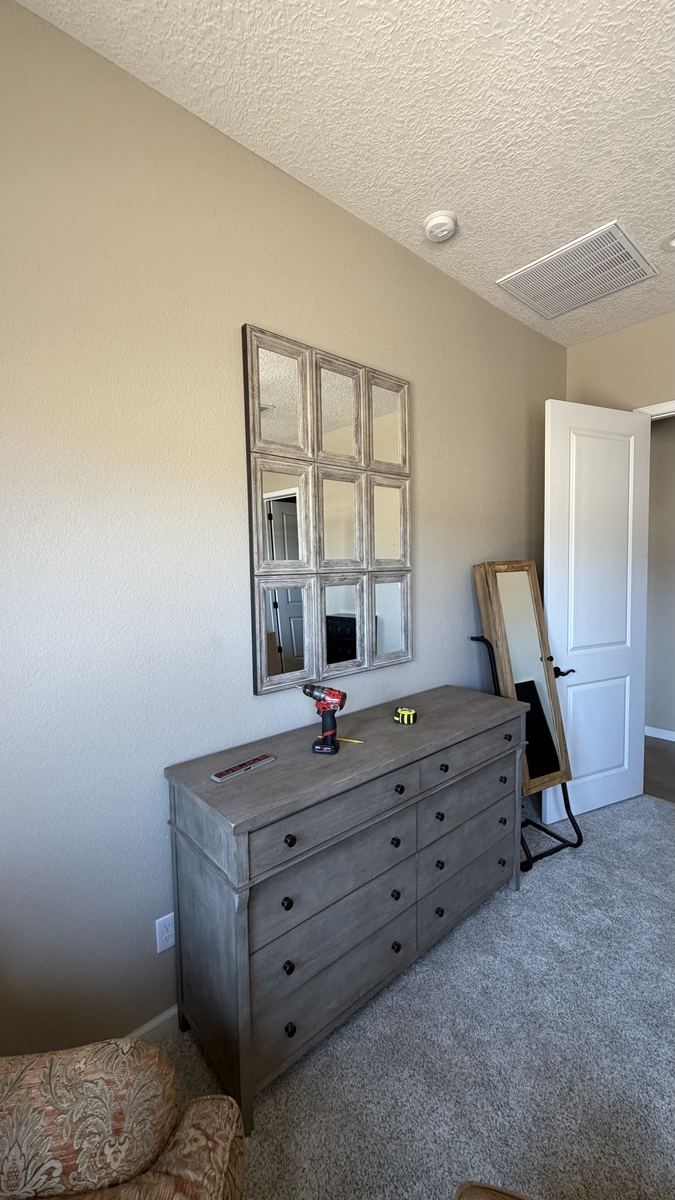 Heavy mirror hung in an Albuquerque home