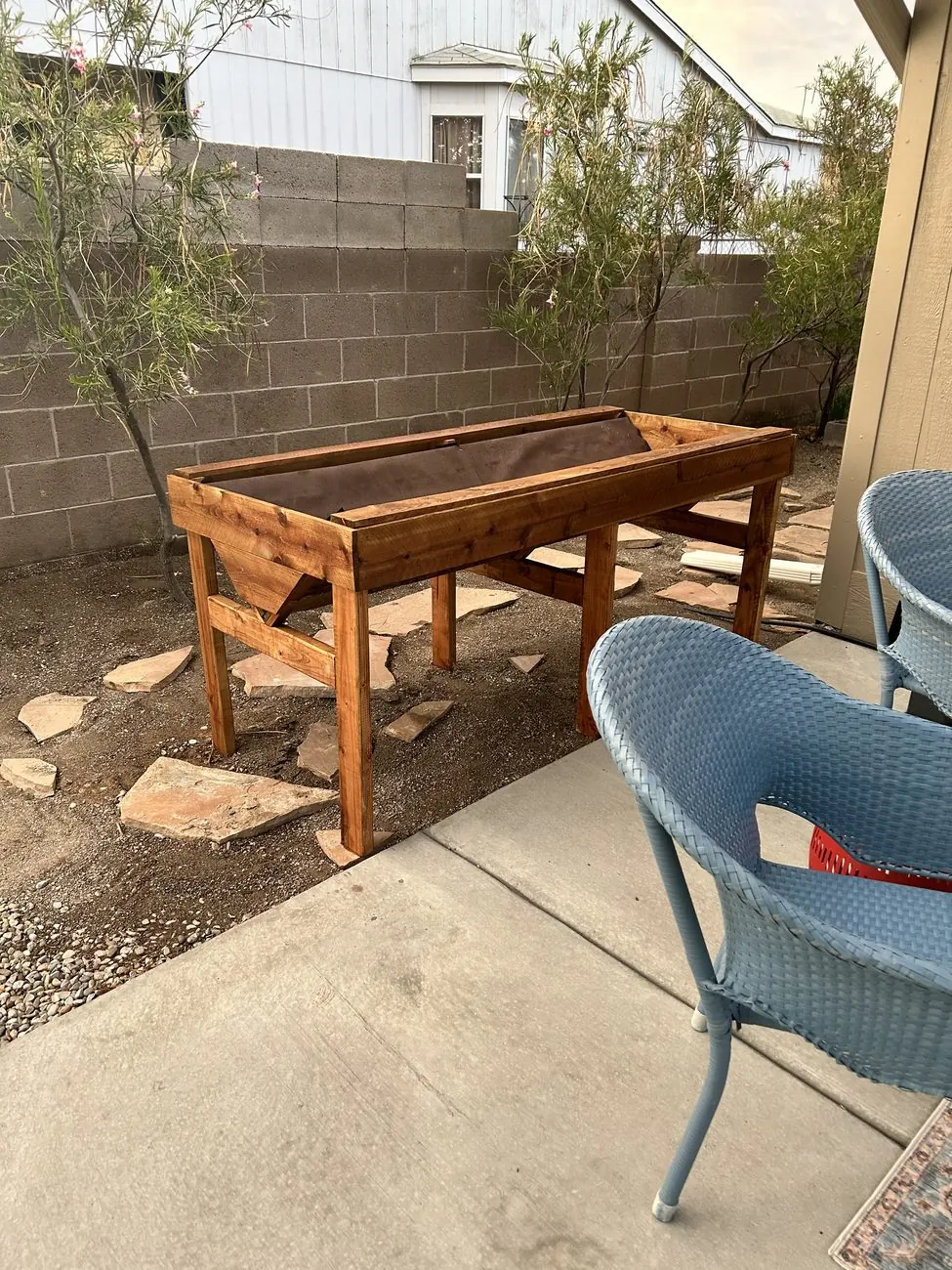 Custom raised planter box stained and finished