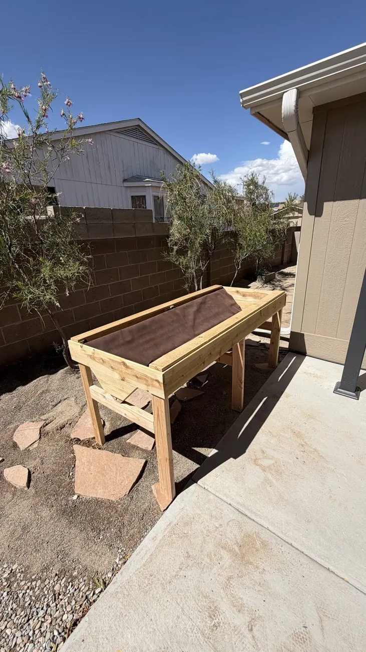 Custom raised planter box built, before staining