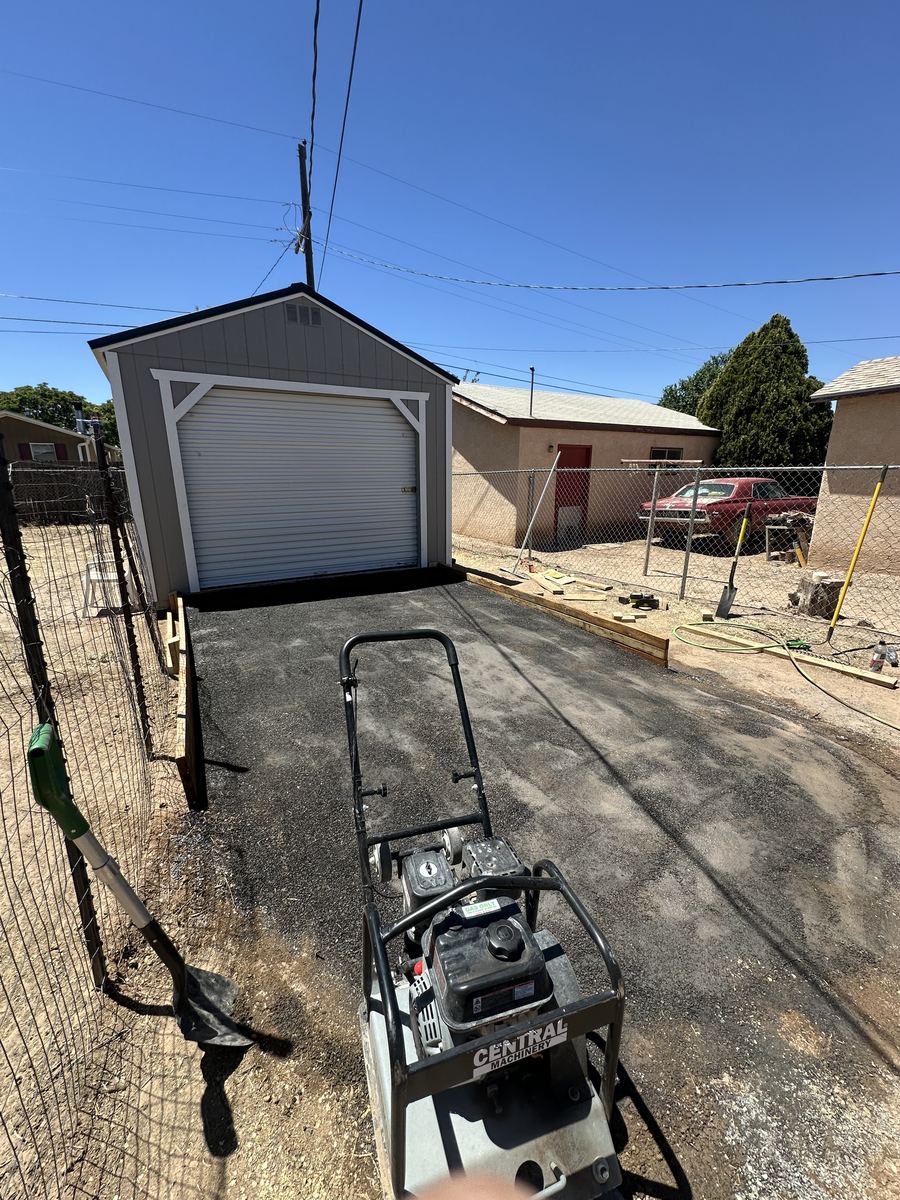 Compacted base pad installed for a shed
