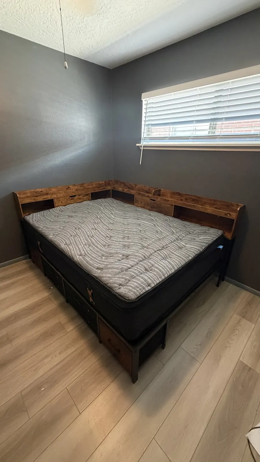 Corner storage bed with shelving headboard and drawers assembled