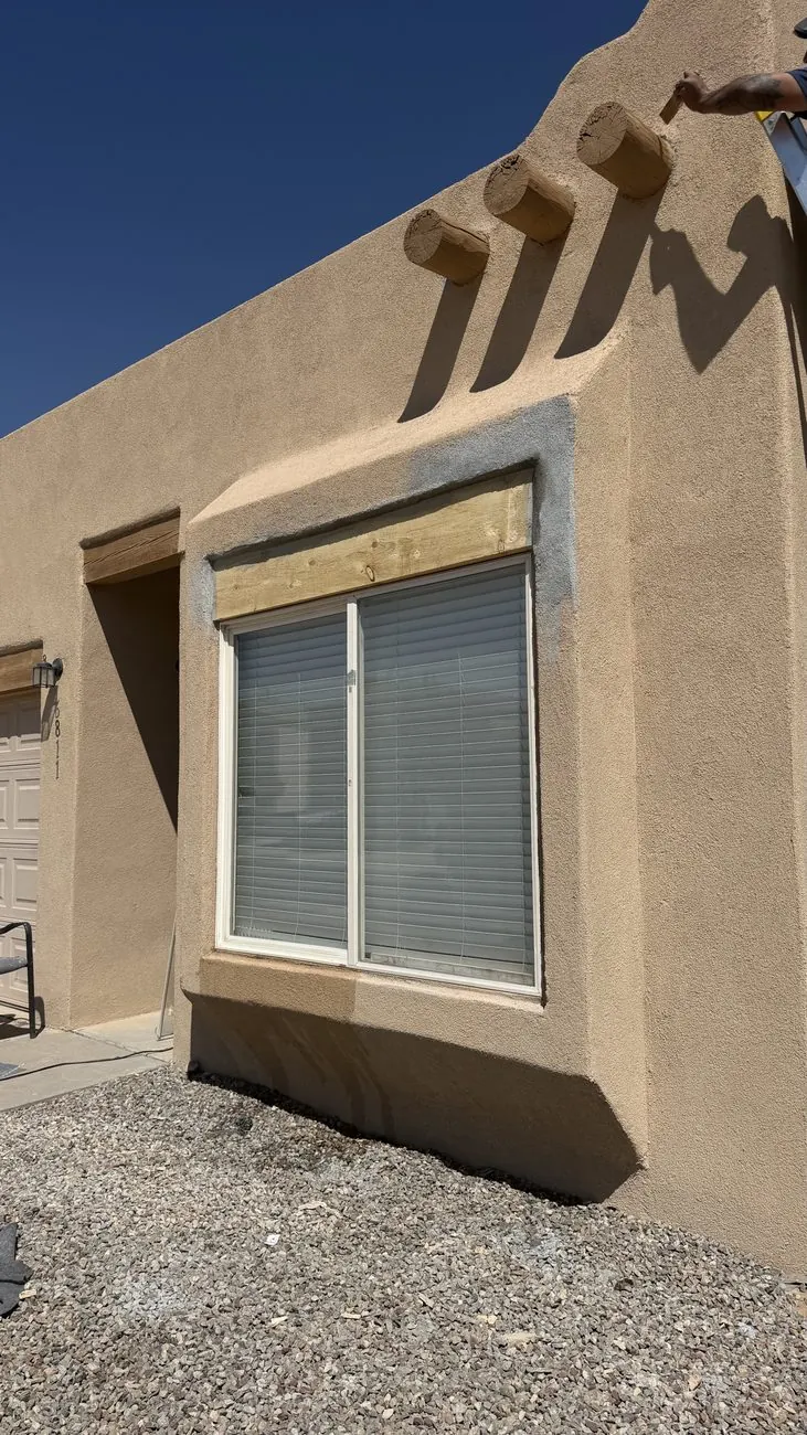 New window header installed and stucco patched in