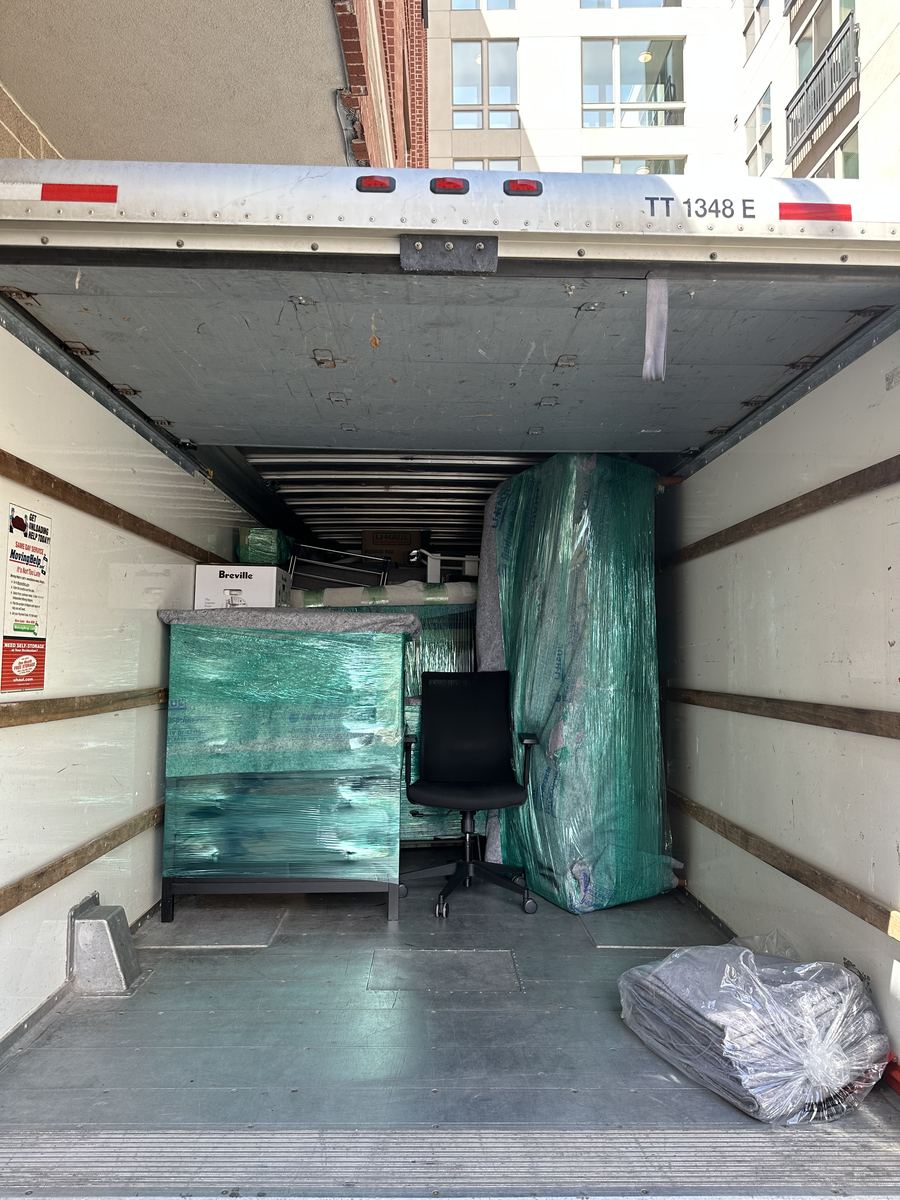 Heavy items loaded and protected with blankets