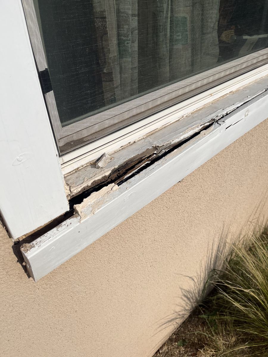 Rotted window sill before replacement